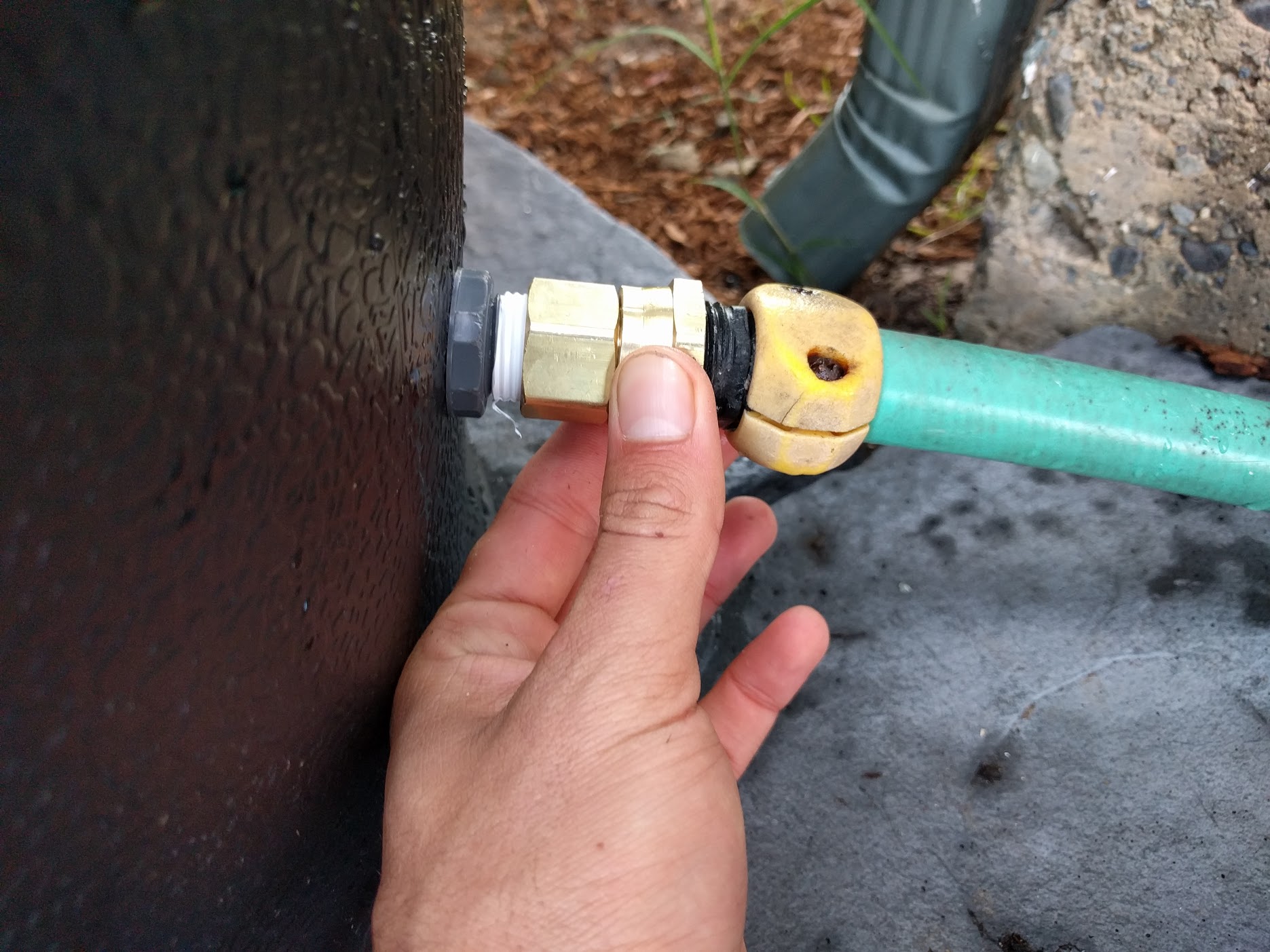 barrel float with garden hose connected
